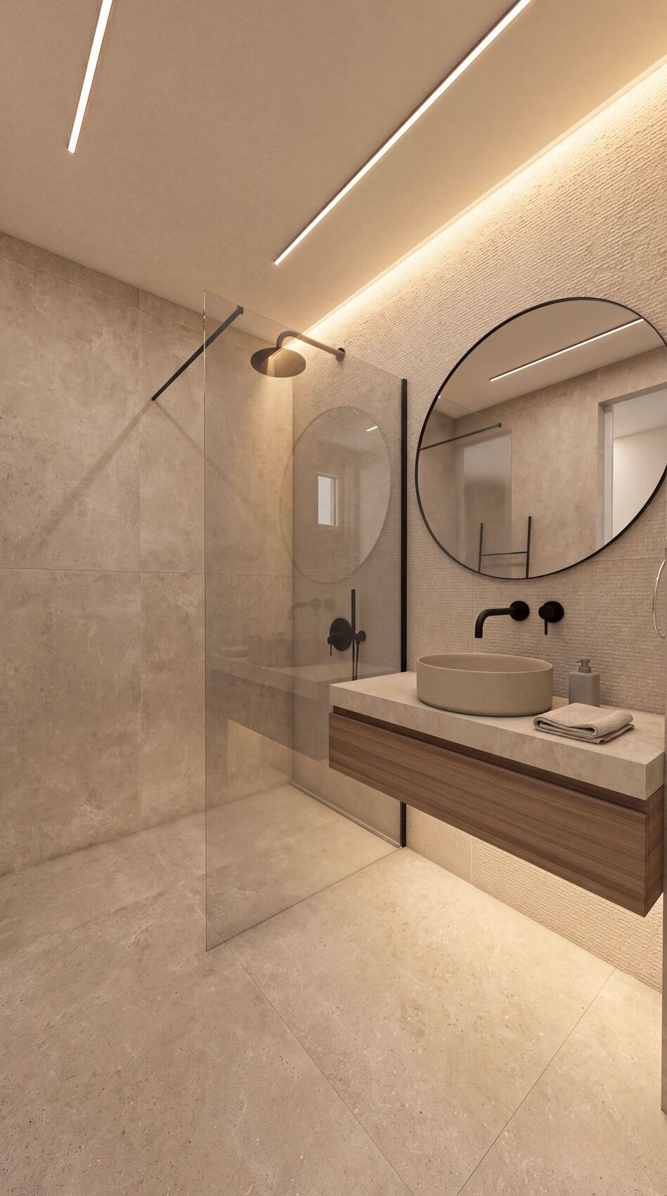 Baño de invitados con ducha, espejo redondo y cajón de madera.