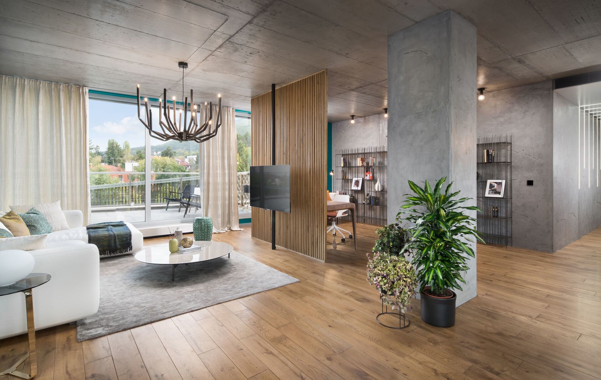 Wohnraum mit klarer Anordnung von Möbeln, Beleuchtung und architektonischen Linien
