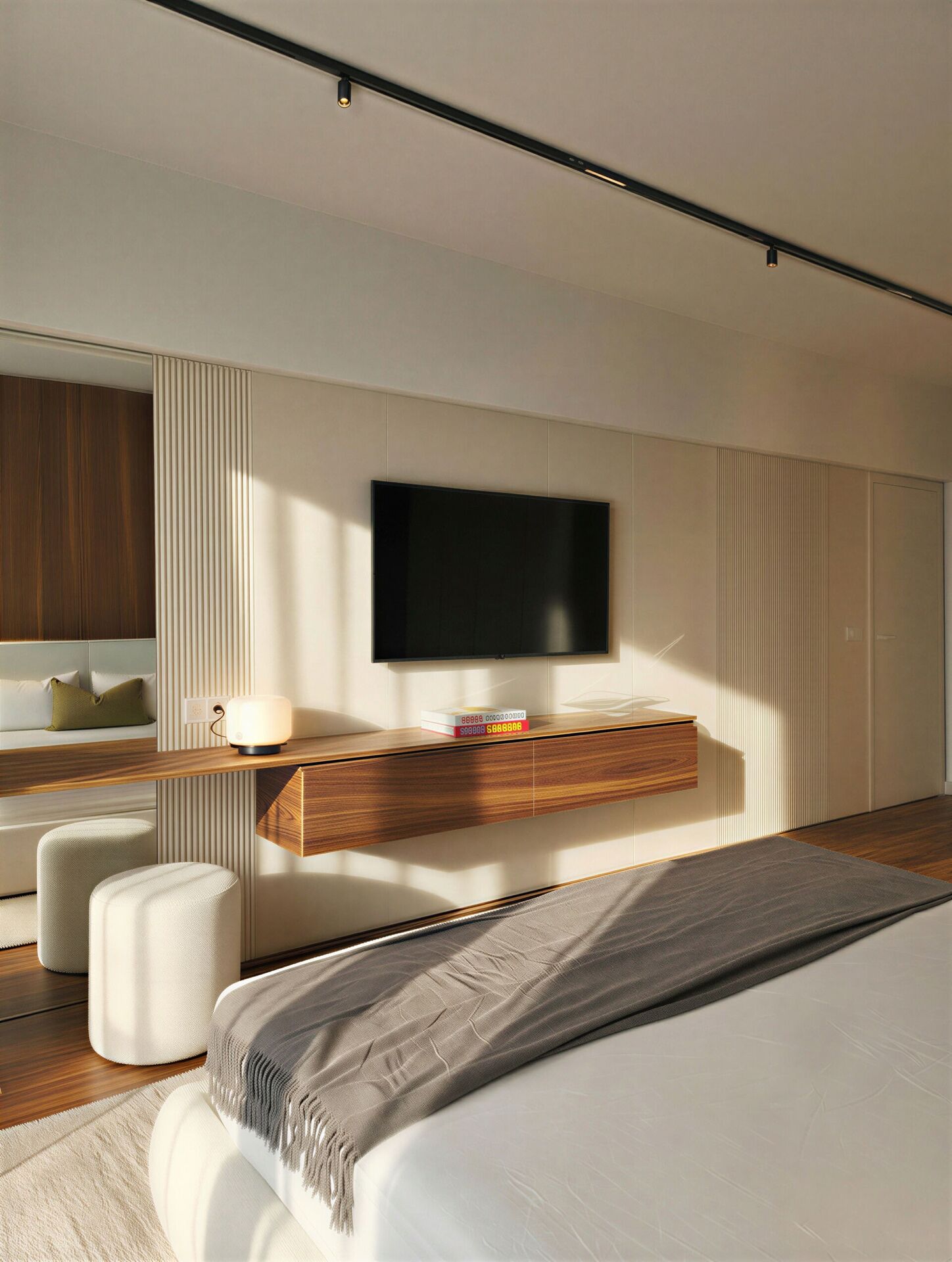 Die Wand gegenüber dem Bett: schwebende Nussbaumkonsole, Fernseher und runder Hocker.