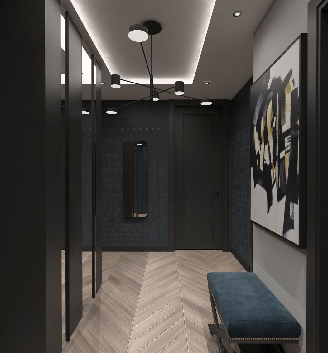 Visualisation de l’entrée : portes miroir, banc et tableau abstrait.