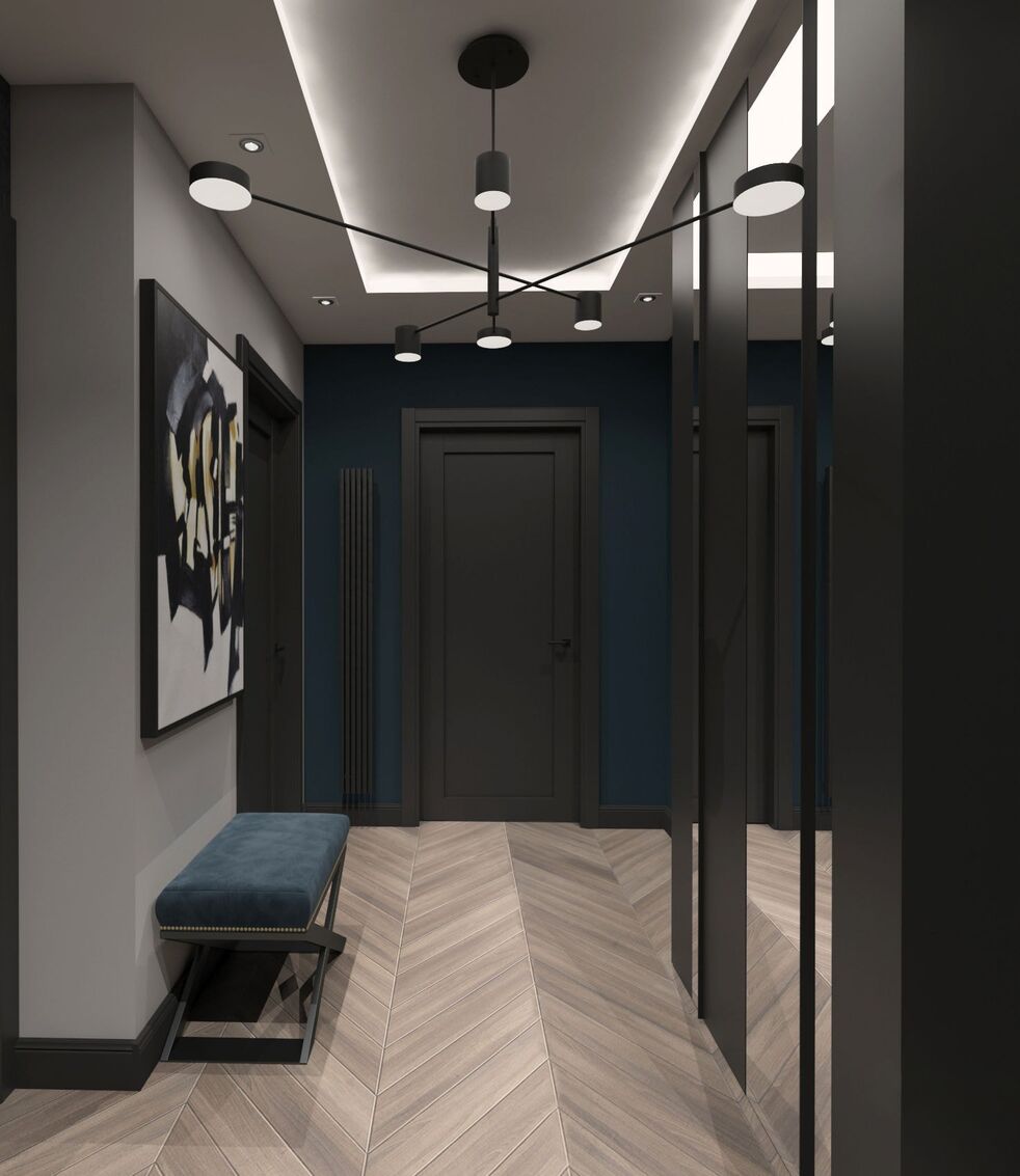 Visualisation vers un mur bleu marine, la porte et le dressing miroir.