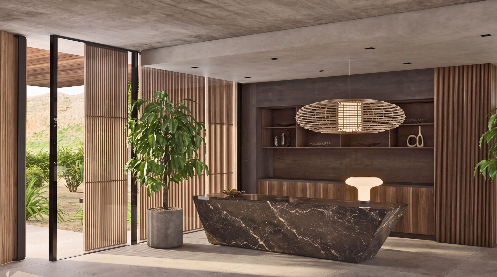 Réception : un bureau de marbre sombre, une suspension en rotin et des meubles de bois.