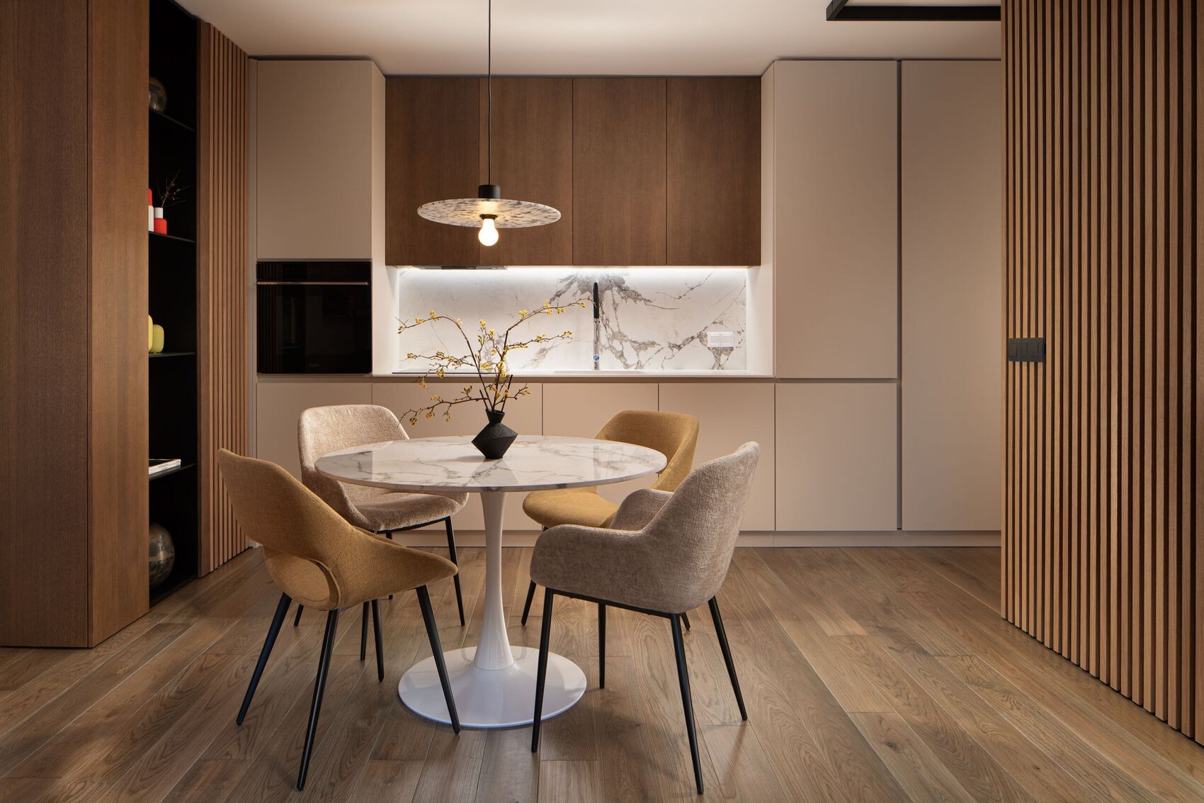 The round table and kitchen run.