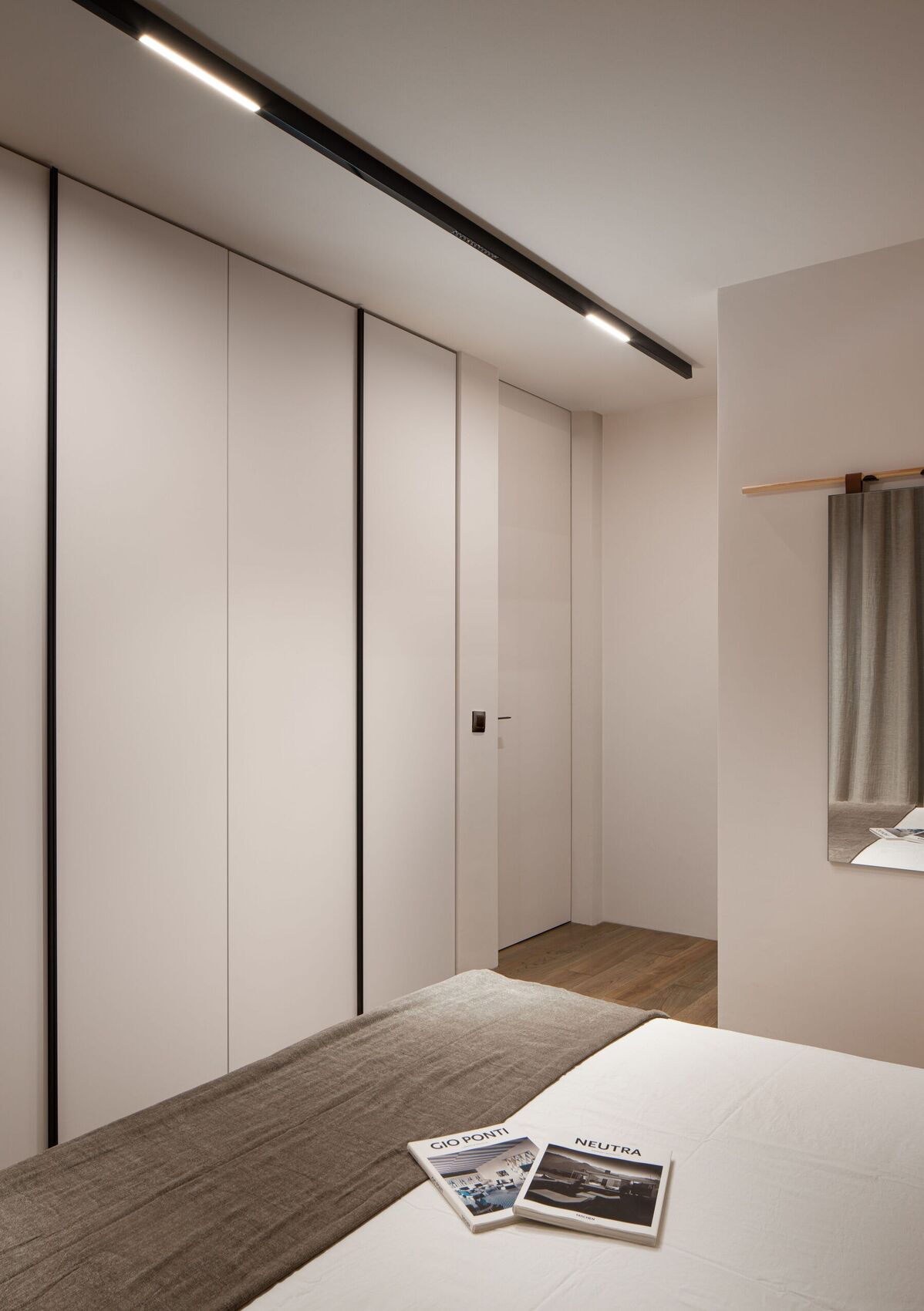 The wardrobe wall in the bedroom.